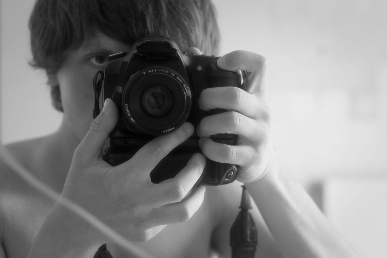 Ustin with Canon DSLR film camera